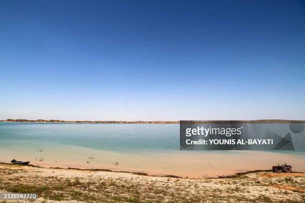 This picture taken on April 3, 2024 shows a view of Lake Hamrin in Iraq's Diyala province which had previously dried up in a drought and filled up...