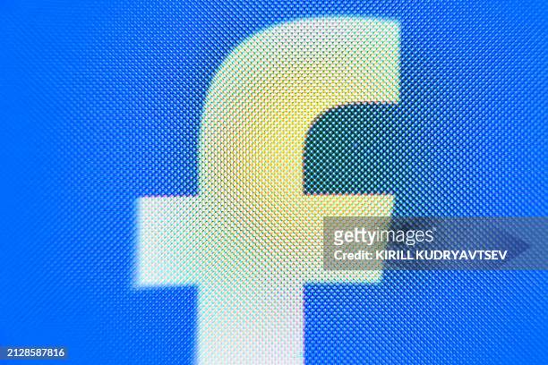 Photo taken on April 3, 2024 shows the logo of US online social media and social networking service Facebook on a smartphone screen in Frankfurt am...