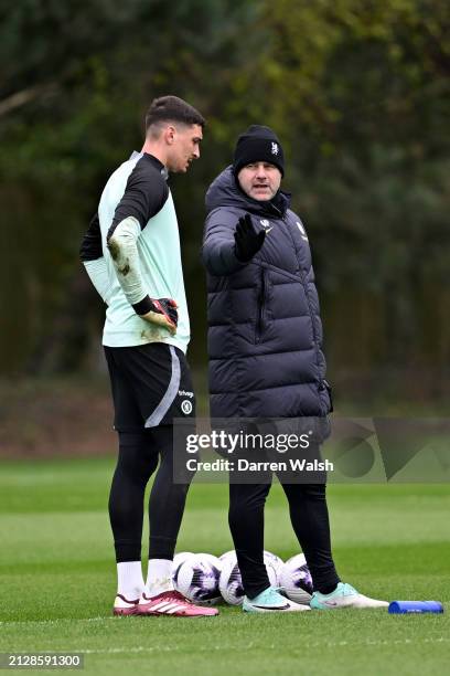 Djordje Petrovic and Head Coach Mauricio Pochettino of Chelsea during a training session at Chelsea Training Ground on April 3, 2024 in Cobham,...