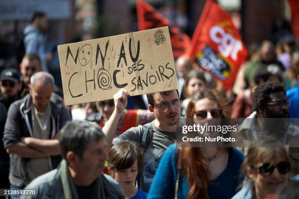 Protester is holding a placard that reads 'no to the shock of knowledges' in Toulouse, France, on April 2, 2024. All unions have called for a day of...