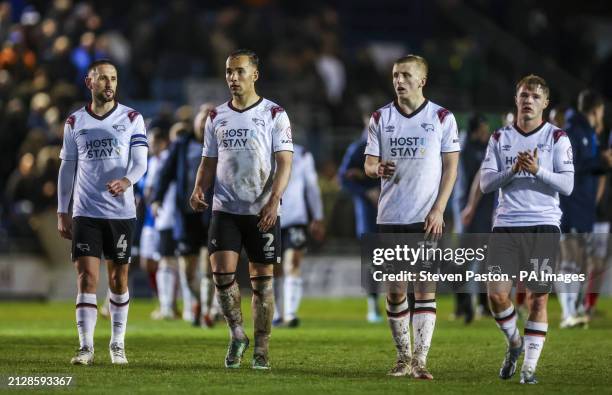 Derby County's Conor Hourihane, Kane Wilson, Louie Sibley and Liam Thompson at the end of the Sky Bet League One match at Fratton Park, Portsmouth....
