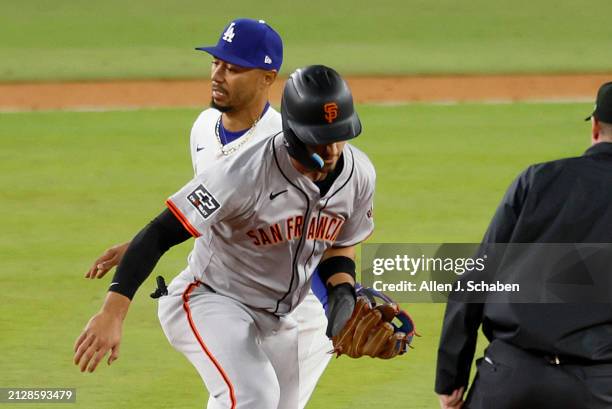 Los Angeles, CA With Wilmer Flores batting, Giants Michael Conforto, #8 center, is picked off and caught stealing 2nd base by Dodgers' Mookie Betts,...