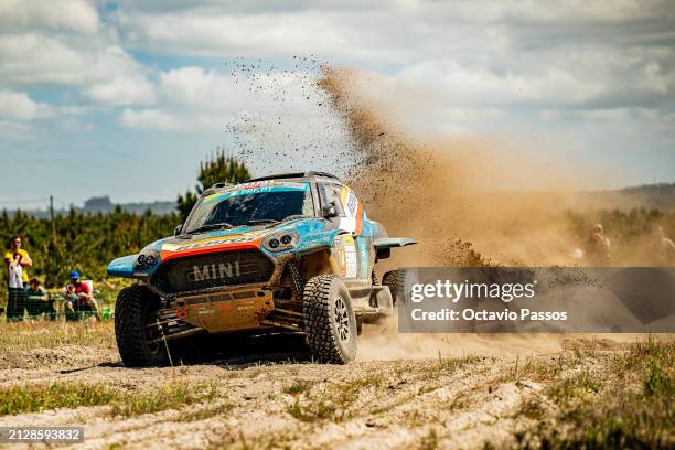 Joao Ferreira of Portugal and Filipe Palmeiro of Portugal compete in their Mini John Cooper Works Rally Plus during the SS1 on day one of the FIA...