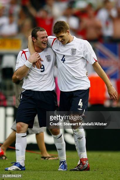 June 15: Wayne Rooney of England and Steven Gerrard of England celebrate during the FIFA World Cup Finals 2006 Group B match between England and...