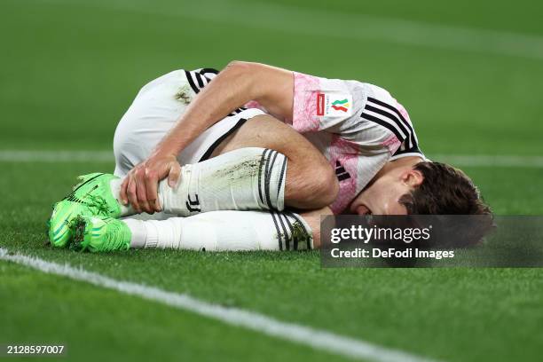 Federico Chiesa of Juventus Fc lies on the ground during the Coppa Italia Semi-final match between Juventus FC and SS Lazio at Allianz Stadium on...