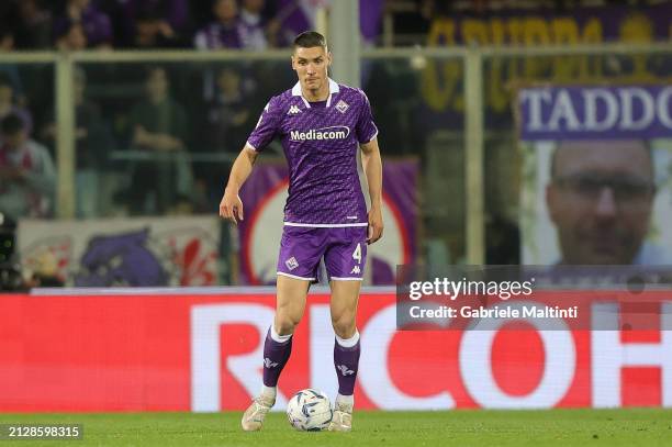 Nikola Milenkovic of ACF Fiorentina in action during the Coppa Italia Semi-final match between ACF Fiorentina and Atalanta at Stadio Artemio Franchi...