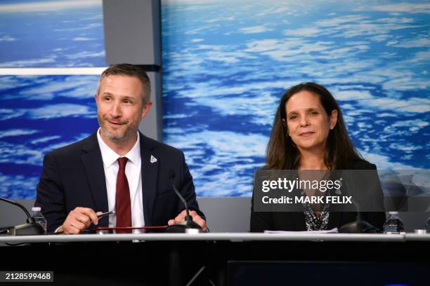 Jacob Bleacher, chief exploration scientist, NASA Headquarters, talks with Lara Kearney, manager, Extravehicular Activity and Human Surface Mobility...