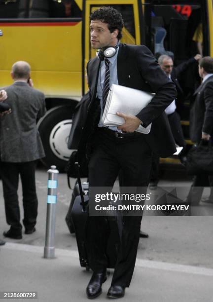English Chelsea football midfielder Michael Ballack walks upon his arrival at a Moscow hotel on May 19, 2008. After ploughing millions into Chelsea,...