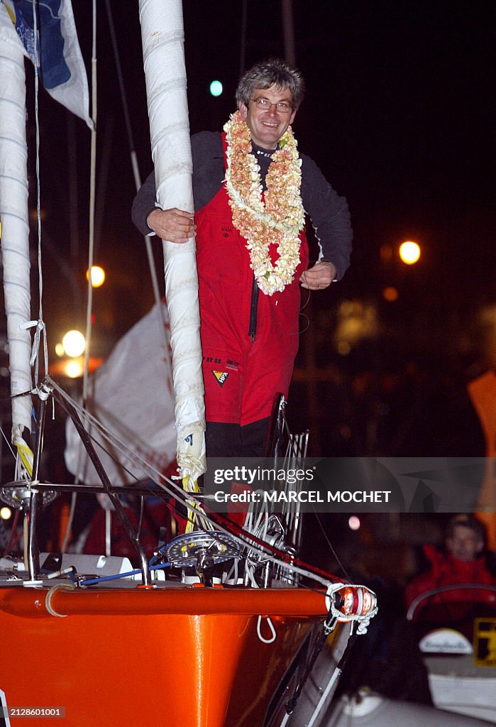 Captain Riou French sailor Vincent Riou celebrates victory late 02 February 2005 ...