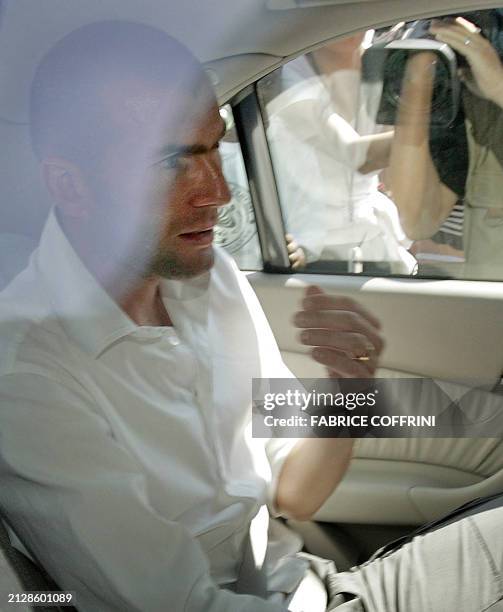 France's Zinedine Zidane leaves the FIFA headquarters 20 July 2006 in Zurich, after he appeared before the disciplinary comission over his World Cup...