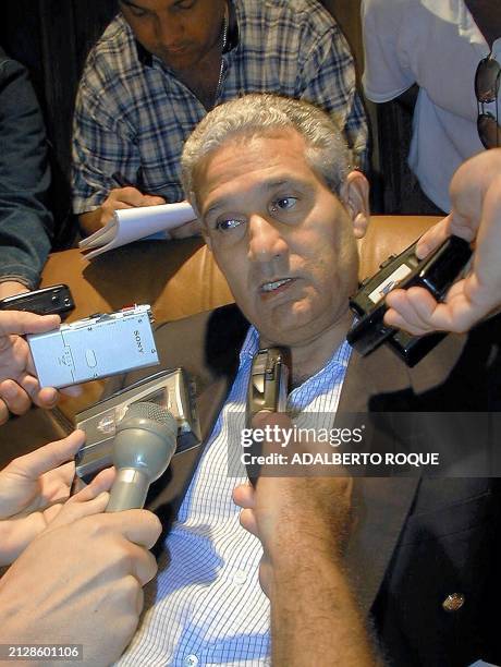 President of the Olympic Committee of the Dominican Republic José Joaquín Poello speaks at a press conference upon his arrival in Havana 26 March...