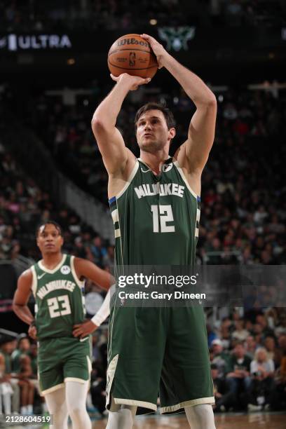 Danilo Gallinari of the Milwaukee Bucks shoots a free throw during the game against the Memphis Grizzlies on April 3, 2024 at the Fiserv Forum Center...