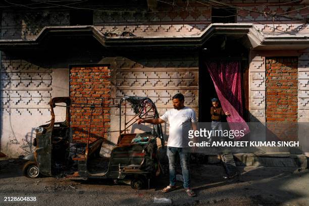 This photograph taken on March 18, 2024 shows Parvez Qureshi, elder brother of Faheem Qureshi, who was killed in anti-Muslim riots in February,...