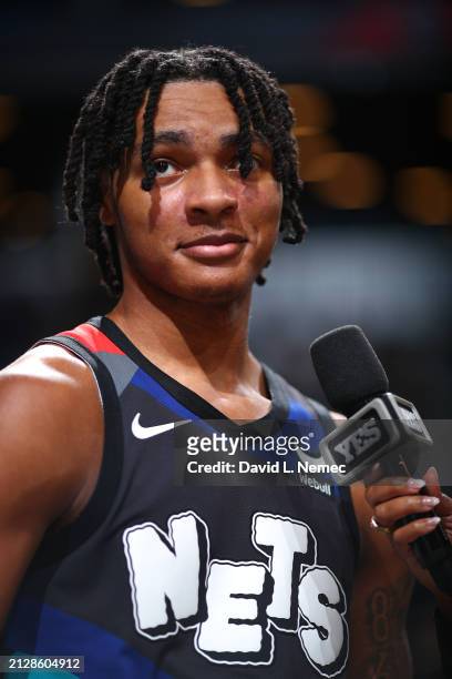 Noah Clowney of the Brooklyn Nets talks to the media after the game against the Indiana Pacers on April 3, 2024 at Barclays Center in Brooklyn, New...