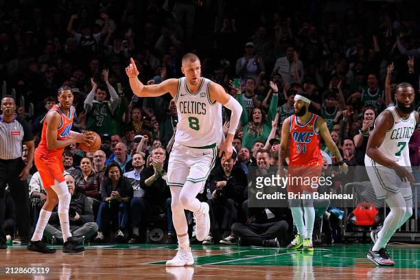 Kristaps Porzingis of the Boston Celtics celebrates during the game against the Oklahoma City Thunder on April 3, 2024 at the TD Garden in Boston,...