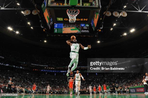 Jaylen Brown of the Boston Celtics dunks the ball during the game against the Oklahoma City Thunder on April 3, 2024 at the TD Garden in Boston,...