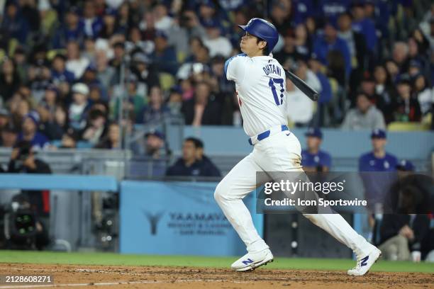 Los Angeles Dodgers designated hitter Shohei Ohtani homers in the seventh inning during the game between the San Francisco Giants and the Los Angeles...