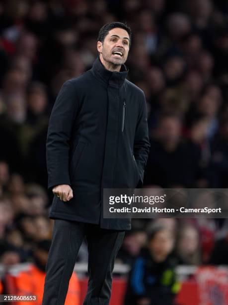 Arsenal manager Mikel Arteta shouts instructions to his team from the technical area during the Premier League match between Arsenal FC and Luton...