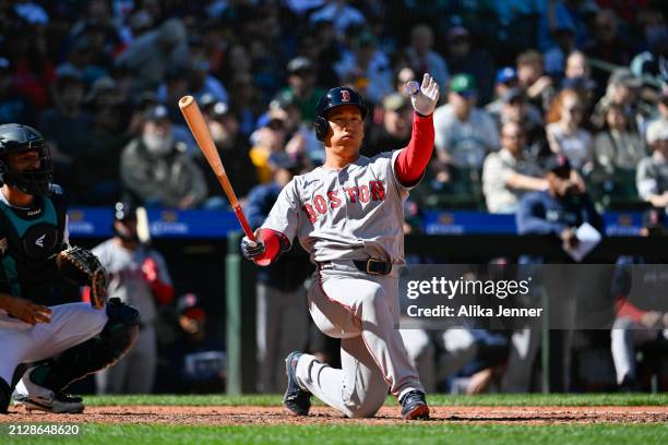 Masataka Yoshida of the Boston Red Sox bats during the game against the Seattle Mariners at T-Mobile Park on March 31, 2024 in Seattle, Washington....