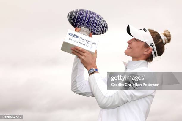 Nelly Korda of the United States poses with the trophy after the final round of the Ford Championship presented by KCC at Seville Golf and Country...