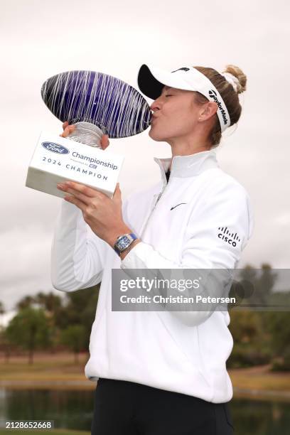 Nelly Korda of the United States poses with the trophy after the final round of the Ford Championship presented by KCC at Seville Golf and Country...