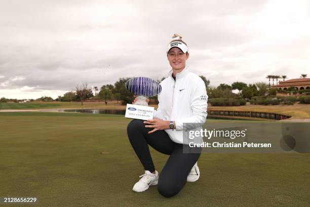 Nelly Korda of the United States poses with the trophy after the final round of the Ford Championship presented by KCC at Seville Golf and Country...
