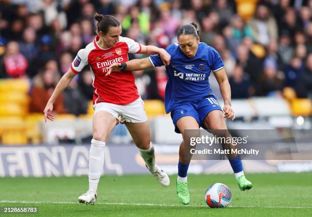 Lotte Wubben-Moy of Arsenal battles for possession with Lauren James of Chelsea during the FA Women's Continental Tyres League Cup Final match...
