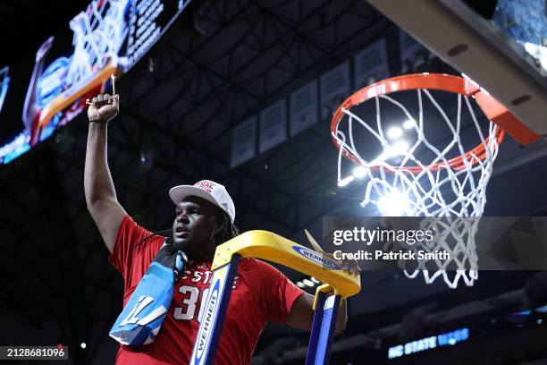 Burns Jr. #30 of the North Carolina State Wolfpack walks off the court after the Wolfpack defeated the Duke Blue Devils to advance to the Final Four...