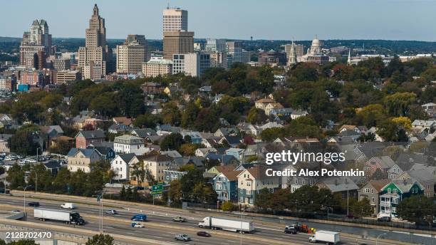 providence downtown distant view with highway 195 / i-195 with traffic on it. - providence rhode island highway stock pictures, royalty-free photos & images