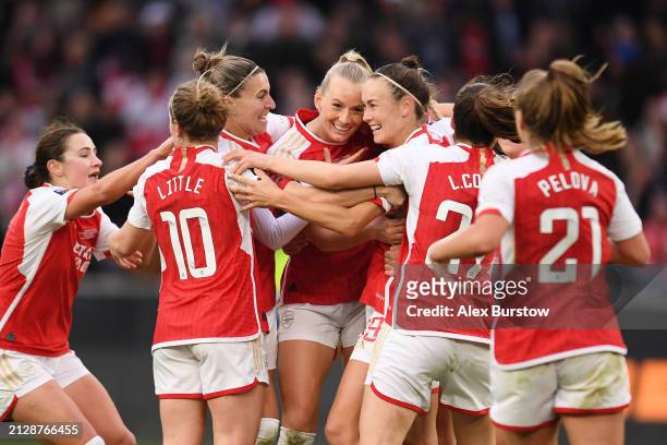 Stina Blackstenius of Arsenal celebrates with teammates Emily Fox, Kim Little, Steph Catley and Caitlin Foord after scoring her team's first goal...