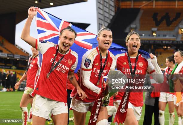 Caitlin Foord, Steph Catley and Kyra Cooney-Cross of Arsenal celebrate with the trophy after winning the FA Women's Continental Tyres League Cup...