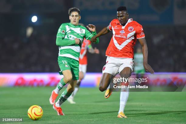 Santiago Munoz of Santos fights for the ball with Moises Castillo of Juarez during the 13th round match between FC Juarez and Santos Laguna as part...