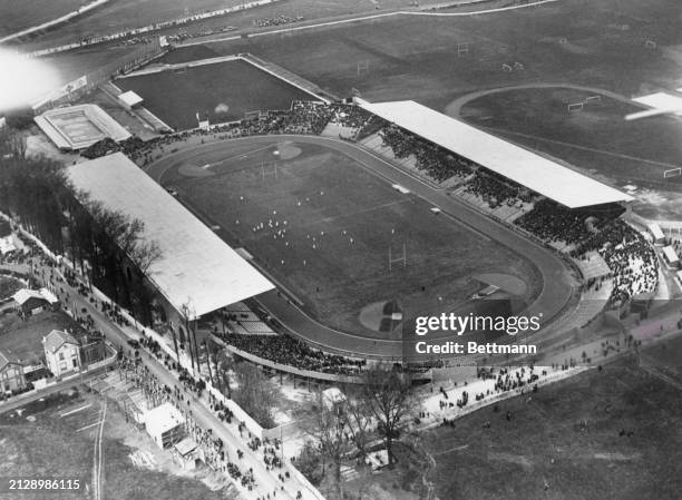 Ariel view of the Olympic Stadium during the opening rugby match of the 1924 summer Olympic games in Paris, France.