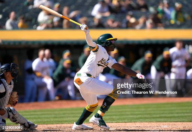 Lawrence Butler of the Oakland Athletics bats against the Cleveland Guardians in the bottom of the ninth inning on March 31, 2024 at the Oakland...