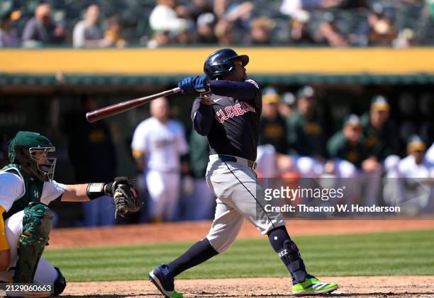 Jose Ramirez of the Cleveland Guardians bats against the Oakland Athletics in the top of the eighth inning on March 31, 2024 at the Oakland Coliseum...