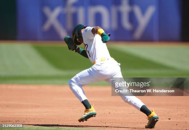 Esteury Ruiz of the Oakland Athletics takes off to steal second base against the Cleveland Guardians in the bottom of the first inning on March 31,...