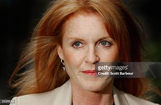 Britain's Dutchess of York Sarah poses for photographers as she arrives at the Joan Collins Charity Auction July 1, 2003 in London, England. The...