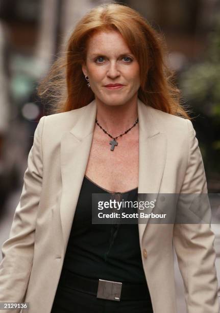Britain's Dutchess of York Sarah poses for photographers as she arrives at the Joan Collins Charity Auction July 1, 2003 in London, England. The...