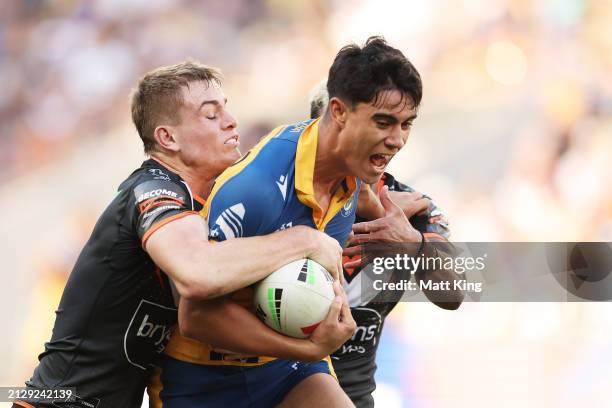 Blaize Talagi of the Eels is tackled during the round four NRL match between Parramatta Eels and Wests Tigers at CommBank Stadium, on April 01 in...