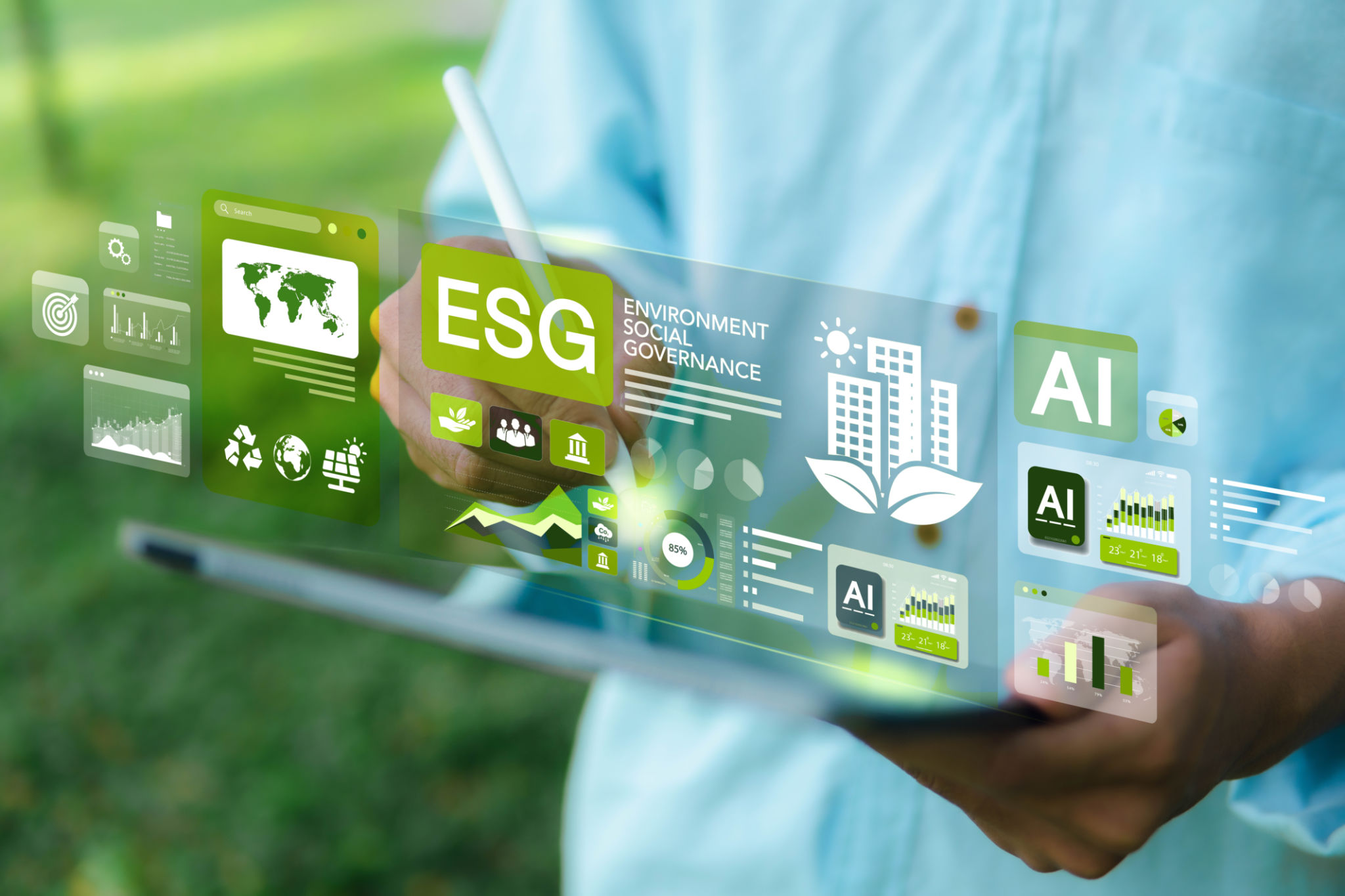ESG concepts for environment, society and governance. Businessman uses iPad to analyze ESG in business investment strategy concept. which the screen shows with a green graph ESG concepts for environment, society and governance. Businessman uses iPad to analyze ESG in business investment strategy concept. which the screen shows with a green graph