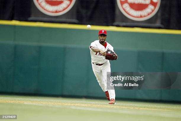 Shortstop Jimmy Rollins of the Philadelphia Phillies throws the ball to first base against the Boston Red Sox during interleague play at Veterans...