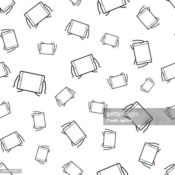 hands holding tablet pc. seamless pattern. line icons on white background - using tablet blank screen stock illustrations