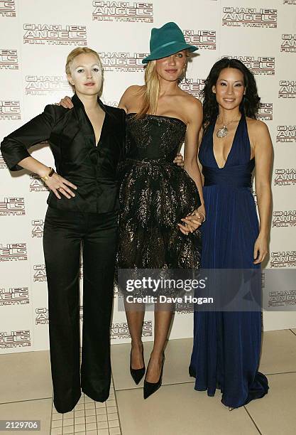 Actress Drew Barrymore, Cameron Diaz and Lucy Liu attend the premiere of Columbia Pictures' film "Charlies Angels 2: Full Throttle" at the Odeon...