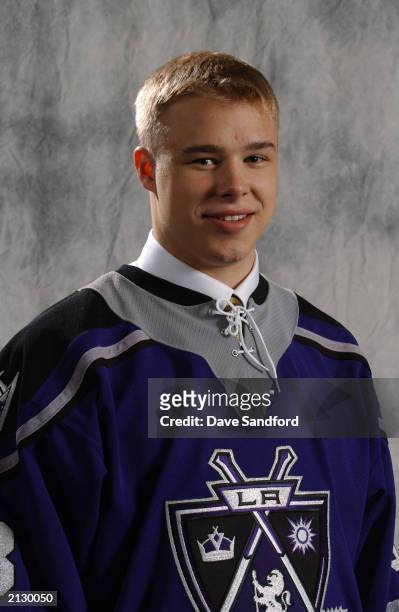 Dustin Brown the first round draft pick of the Los Angeles Kings poses for a portrait after the 2003 NHL Entry Draft at the Gaylord Entertainment...