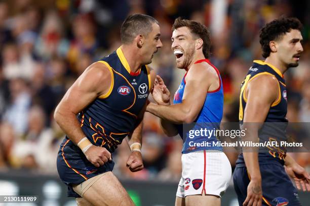 Taylor Walker of the Crows and Jack Viney of the Demons clash during the 2024 AFL Round 04 match between the Adelaide Crows and the Melbourne Demons...