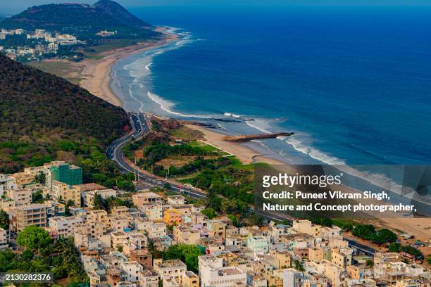 aerial view of vizag city from kailasagiri park showing majestic beaches, roads and hills in hdr - kailasagiri park stock pictures, royalty-free photos & images
