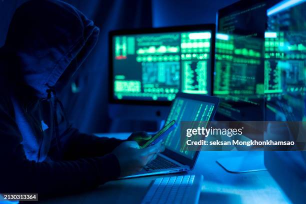 hacker, it and person with code on computer, programming and phishing scam with malware or virus. - pirate informatique photos et images de collection