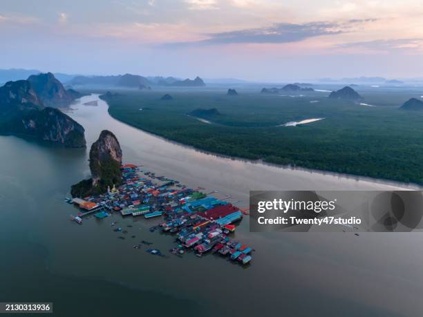 aerial view of floating village on panyee island in phang nga bay in thailand - floating island stock pictures, royalty-free photos & images