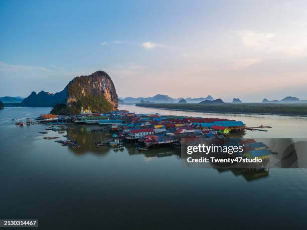 aerial view of floating village on panyee island in phang nga bay in thailand - floating island stock pictures, royalty-free photos & images