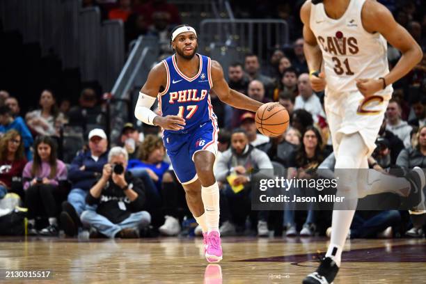 Buddy Hield of the Philadelphia 76ers brings the ball down court during the second quarter against the Cleveland Cavaliers at Rocket Mortgage...